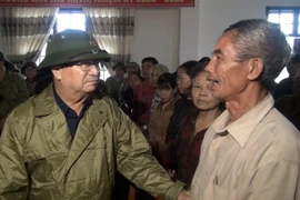Nước dâng cao tại khu vực xã Hàm Ninh, huyện Quảng Ninh, tỉnh Quảng Bình. (Ảnh: Văn Tý/TTXVN)