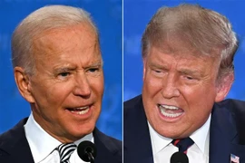 Tổng thống Mỹ Donald Trump (phải) và ứng cử viên Tổng thống của đảng Dân chủ Joe Biden (trái) tại cuộc tranh luận trực tiếp đầu tiên ở Cleveland, bang Ohio ngày 29/9/2020. (Ảnh: AFP/TTXVN)