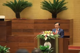 Bộ trưởng Bộ Tài chính Đinh Tiến Dũng, trình bày Báo cáo kết quả thực hiện ngân sách nhà nước năm 2020, dự toán ngân sách nhà nước và phương án phân bổ ngân sách trung ương năm 2021. (Ảnh: Văn Điệp/TTXVN)
