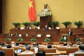 Phó Thủ tướng Thường trực Trương Hòa Bình tình bày báo cáo của Chính phủ về công tác phòng ngừa, chống tội phạm và vi phạm pháp luật; công tác thi hành án và công tác phòng, chống tham nhũng năm 2020. (Ảnh: Lâm Khánh/TTXVN)
