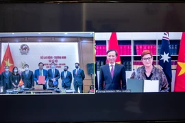 Lễ ký kết Bản ghi nhớ được tổ chức theo hình thức trực tuyến tại hai điểm cầu Việt Nam và Australia. (Ảnh: PV/Vietnam+)