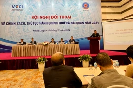 Hội nghị đối thoại về chính sách, thủ tục hành chính thuế và hải quan năm 2024, ngày 11/12. (Ảnh: Vietnam+)