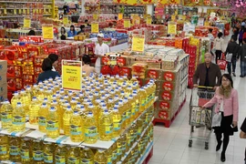 Số lượng hóa đơn điện tử khởi tạo từ máy tính tiền ở giai đoạn 1 là 2,2 triệu hóa đơn và đến nay con số này đã tăng gấp 47,6 lần, đạt 104,8 triệu hóa đơn. (Ảnh: Vietnam+)