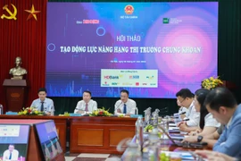 Hội thảo “Tạo động lực nâng hạng thị trường chứng khoán,”ngày 2/7. (Ảnh: Vietnam+)