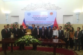 Lễ ký hợp Biên bản ghi nhớ hợp tác lao động giữa Việt Nam và Kampuchea. (Ảnh: PV/Vietnam+)