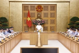 Phó Thủ tướng Lê Thành Long, Chủ tịch Hội đồng Quốc gia về phát triển bền vững phát biểu. (Ảnh: Doãn Tấn/TTXVN)