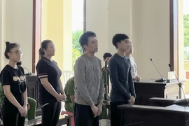 Các bị cáo tại phiên tòa sơ thẩm. (Ảnh: TTXVN phát)