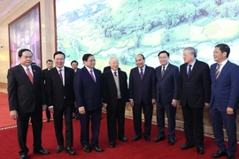 Tổng Bí thư Nguyễn Phú Trọng; Chủ tịch nước Nguyễn Xuân Phúc; Chủ tịch Quốc hội Vương Đình Huệ; Thủ tướng Phạm Minh Chính và các đại biểu dự hội nghị. (Ảnh: Dương Giang/TTXVN)