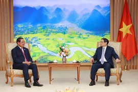 Thủ tướng Phạm Minh Chính tiếp Phó Thủ tướng, Bộ trưởng Bộ Nội vụ Campuchia Samdech Krolahom Sar Kheng. (Ảnh: Dương Giang/TTXVN)