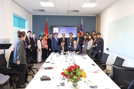 Lễ ký biên bản hợp tác giữa PTiT (Học viện Công nghệ Bưu chính Viễn thông) với ARM Limited. (Ảnh: Phong Hà/TTXVN)