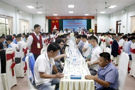 Các kỳ thủ thi đấu nội dung cờ tiêu chuẩn. (Ảnh: Đồng Thúy/TTXVN)