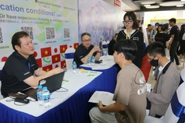 Các tập đoàn, doanh nghiệp Nhật Bản tham gia tuyển dụng tại Ngày hội Việc làm Doanh nghiệp Nhật Bản. (Ảnh: Thanh Vũ/TTXVN)