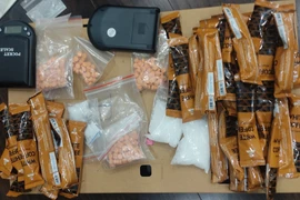 Tang vật thu giữ trong vụ án. (Ảnh: TTXVN phát)