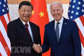 Tổng thống Mỹ Joe Biden (phải) và Chủ tịch Trung Quốc Tập Cận Bình tại cuộc gặp trước thềm Hội nghị thượng đỉnh G20 ở Bali, Indonesia, ngày 14/11/2022. (Ảnh: AFP/TTXVN) 