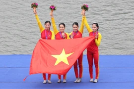 Đội Rowing Việt Nam giành Huy chương Đồng tại Asian Games 19 . (Ảnh: Hoàng Linh/TTXVN) 