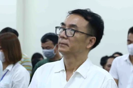Bị cáo Trần Hùng, cựu Phó Cục trưởng Cục Quản lý thị trường (Bộ Công Thương) bị phạt 9 năm tù về tội Nhận hối lộ. (Ảnh: Phạm Kiên/TTXVN)