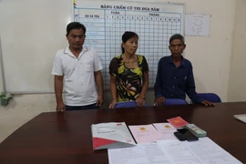 Các đối tượng tại cơ quan công an. (Ảnh: TTXVN phát)