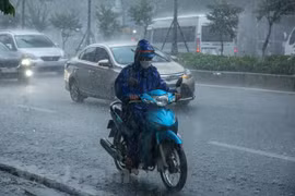 Cả ba miền trên cả nước ngày cuối tuần đều có mưa rào và dông rải rác. (Ảnh: Minh Sơn/Vietnam+)