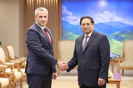 Thủ tướng Phạm Minh Chính tiếp ngài Vladimir Baravikov, Đại sứ Đặc mệnh toàn quyền nước Cộng hòa Belarus tại Việt Nam (2022). (Ảnh: Dương Giang/TTXVN)