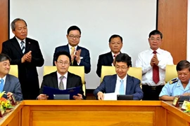 Quang cảnh lễ ký Bản ghi nhớ. (Nguồn: PV/Vietnam+)