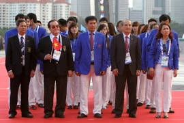 SEA Games 28: Quốc kỳ Việt Nam tung bay trên bầu trời Singapore