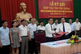 Quang cảnh lễ ký kết. (Ảnh: PV/Vietnam+)