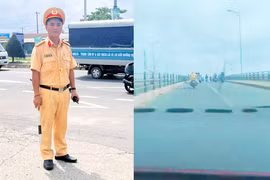 Thiếu tá Phạm Minh Hướng, cán bộ Phòng Cảnh sát Giao thông Công an thành phố Cần Thơ dùng xe môtô chuyên dùng dẫn đường cho xe ôtô chở sản phụ bị vỡ ối đến bệnh viện kịp thời. (Ảnh: Công an cung cấp)