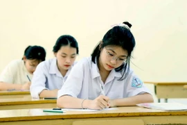 Thí sinh tại điểm thi Trường THPT Tô Hiệu, thành phố Sơn La. (Ảnh: Quang Quyết/TTXVN)
