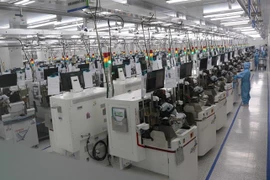 Công ty TNHH ITM Semiconductor Việt Nam, khu công nghiệp VSIP, tỉnh Bắc Ninh duy trì, đảm bảo hoạt động sản xuất. (Ảnh: Thái Hùng/TTXVN)