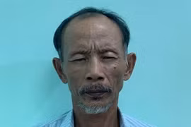 Đối tượng Bùi Văn Trực bị bắt giữ tại cơ quan Công an. (Ảnh: Thanh Tân/TTXVN)