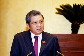 Chủ nhiệm Ủy ban Đối ngoại của Quốc hội Nguyễn Văn Giàu trình bày Báo cáo thẩm tra dự án Luật sửa đổi bổ sung một số điều của Luật Cơ quan đại diện Việt Nam ở nước ngoài. (Ảnh: Nguyễn Dân/TTXVN)