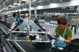 Dây chuyền sản xuất thiết bị điện tử gia dụng tại công ty LG Electronics Việt Nam. (Ảnh: Lâm Khánh/TTXVN)