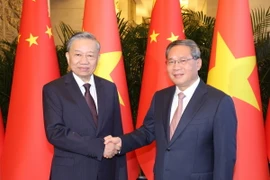 Tổng Bí thư, Chủ tịch nước Tô Lâm hội kiến Thủ tướng Trung Quốc Lý Cường tối 19/8/2024, tại Nhà khách Điếu Ngư Đài ở Thủ đô Bắc Kinh. (Ảnh: Trí Dũng/TTXVN)