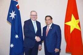 Thủ tướng Phạm Minh Chính gặp Thủ tướng Australia Anthony Albanese. (Ảnh: Dương Giang/TTXVN)