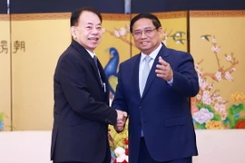 Thủ tướng Phạm Minh Chính tiếp ông Asakawa Masatsugu, Chủ tịch Ngân hàng Phát triển châu Á (ADB). (Ảnh: Dương Giang/TTXVN)
