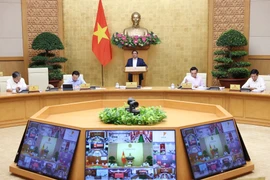 Thủ tướng Phạm Minh Chính chủ trì phiên họp Chính phủ thường kỳ tháng 3 năm 2024 và Hội nghị Chính phủ với địa phương. (Ảnh: Dương Giang/TTXVN)