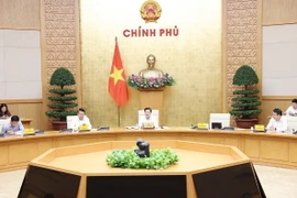 Phó Thủ tướng Lê Minh Khái chủ trì cuộc họp Ban Chỉ đạo điều hành giá. (Ảnh: Dương Giang/TTXVN)