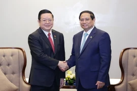Thủ tướng Phạm Minh Chính tiếp Tổng Thư ký ASEAN Kao Kim Hourn. (Ảnh: Dương Giang/TTXVN)