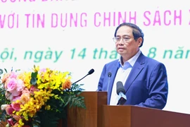 Thủ tướng Phạm Minh Chính phát biểu kết luận Hội nghị Tổng kết 10 năm thực hiện Chỉ thị số 40-CT/TW về tín dụng chính sách xã hội. (Ảnh: Dương Giang/TTXVN)