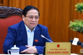 Thủ tướng Phạm Minh Chính chủ trì họp Thường trực Chính phủ về kiểm soát lạm phát. (Ảnh: Dương Giang/TTXVN)