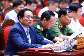 Thủ tướng Phạm Minh Chính dự Hội nghị Quân chính toàn quân 6 tháng đầu năm 2024. (Ảnh: Dương Giang/TTXVN)