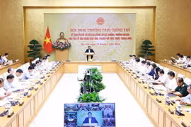 Thủ tướng Phạm Minh Chính chủ trì hội nghị Thường trực Chính phủ với các bộ, ngành, địa phương về chuyển đổi số. (Ảnh: Dương Giang/TTXVN)