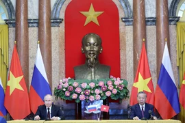 Chủ tịch nước Tô Lâm và Tổng thống Liên bang Nga Vladimir Putin tại cuộc họp báo chung. (Ảnh: Nhan Sáng/TTXVN)