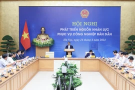 Thủ tướng Phạm Minh Chính chủ trì Hội nghị phát triển nguồn nhân lực bán dẫn. (Ảnh: Dương Giang/TTXVN)