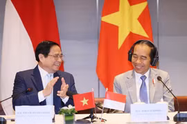 Thủ tướng Phạm Minh Chính và Tổng thống Joko Widodo đồng chủ trì Đối thoại doanh nghiệp cấp cao Việt Nam-Indonesia. (Ảnh: Dương Giang/TTXVN)