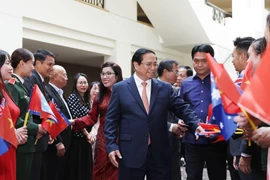 Thủ tướng Phạm Minh Chính và Phu nhân gặp gỡ cán bộ, nhân viên các cơ quan đại diện và cộng đồng người Việt Nam tại Australia. (Ảnh: Dương Giang/TTXVN)