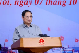 Thủ tướng Phạm Minh Chính chủ trì Hội nghị về chống khai thác hải sản bất hợp pháp. (Ảnh: Dương Giang/TTXVN)