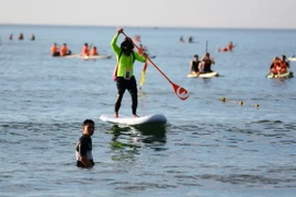 Lực lượng huấn luyện viên không theo dõi hết được hoạt động của các SUP. (Ảnh: Văn Dũng/TTXVN)