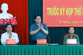Thủ tướng Phạm Minh Chính tiếp xúc cử tri quận Ô Môn, thành phố Cần Thơ. (Ảnh: Dương Giang/TTXVN)