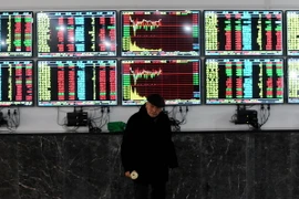 Bảng tỷ giá chứng khoán tại thành phố Vũ Hán, tỉnh Hồ Bắc, miền Trung Trung Quốc ngày 8/1. (Nguồn: AFP/TTXVN)